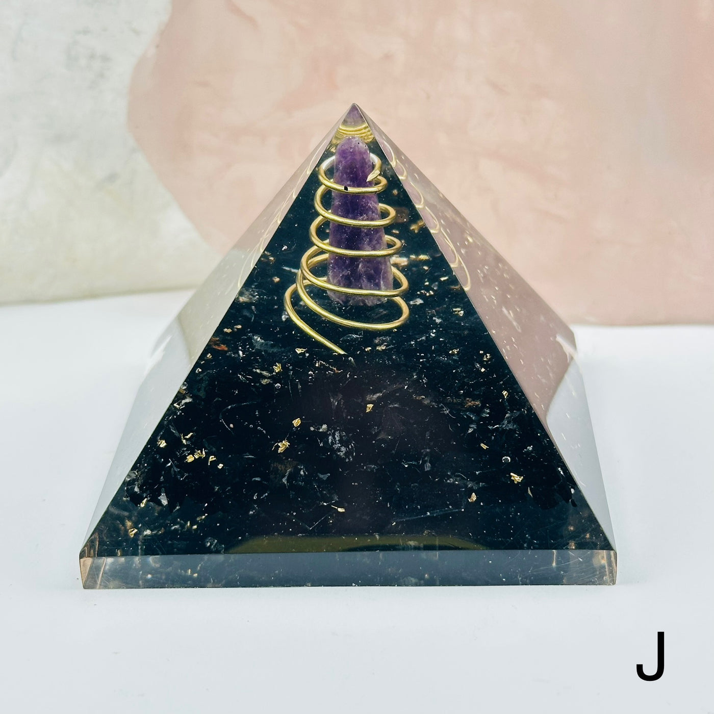 orgone crystal pyramids available with different crystal types. close up of the details on option J