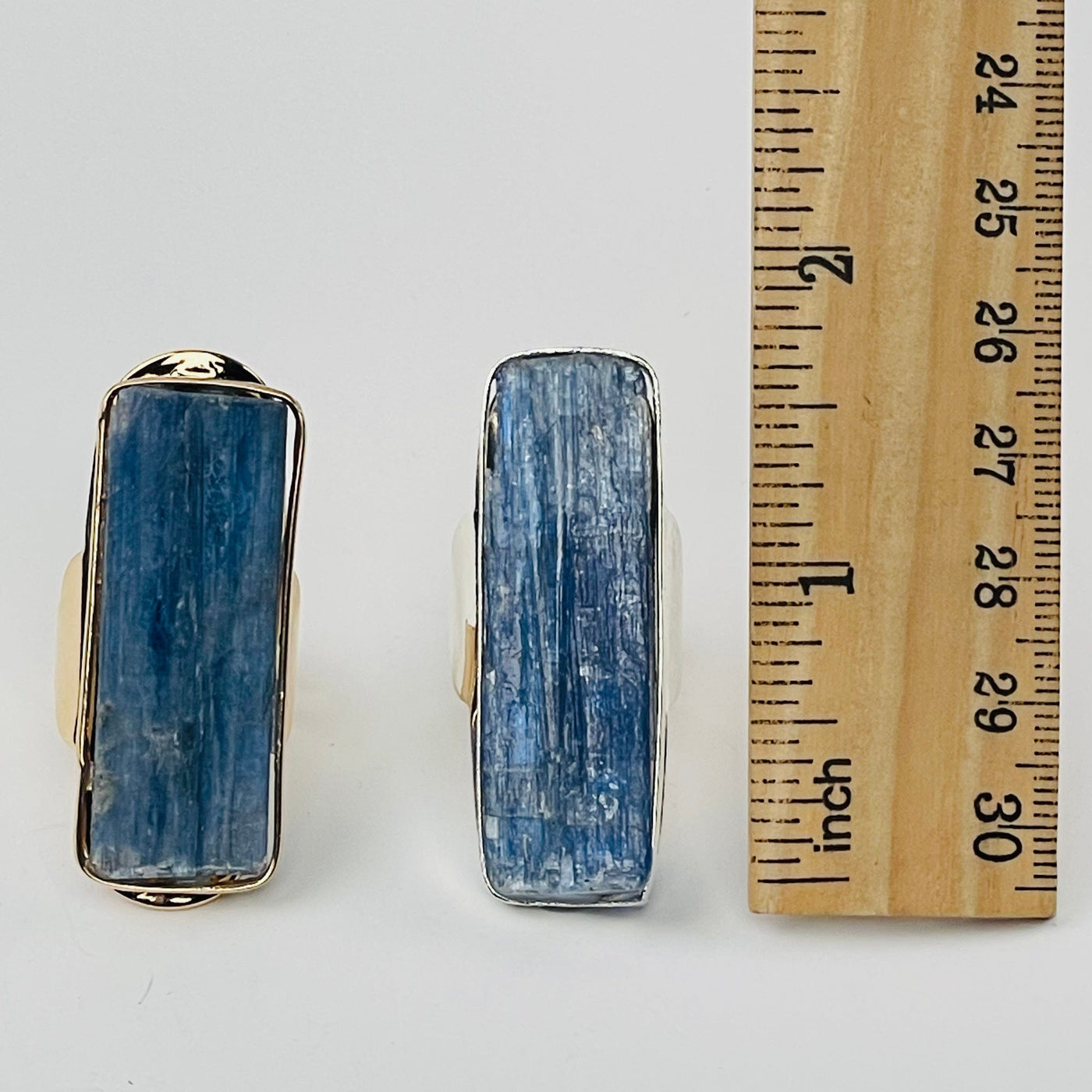 rings next to a ruler for size reference 