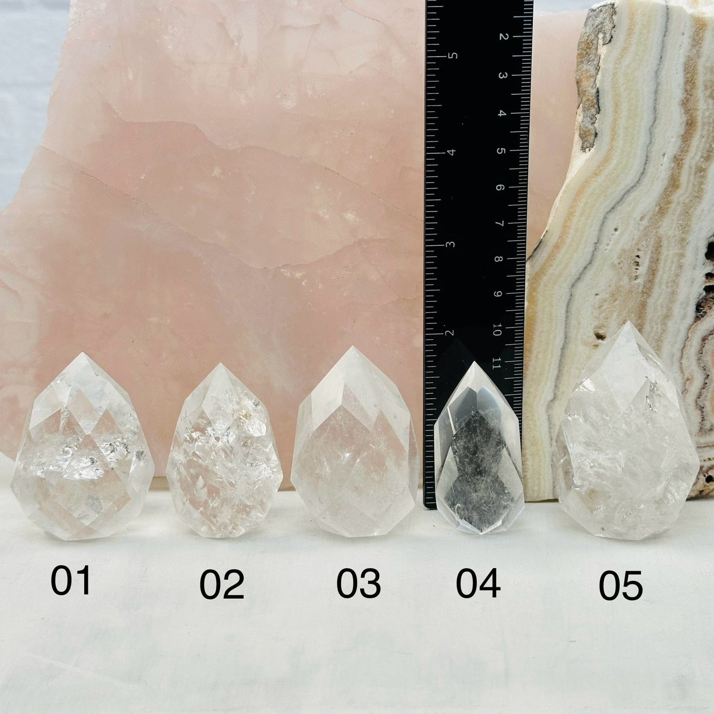 Faceted Clear Quartz Crystal Egg Point - You Choose - next to a ruler for size reference 