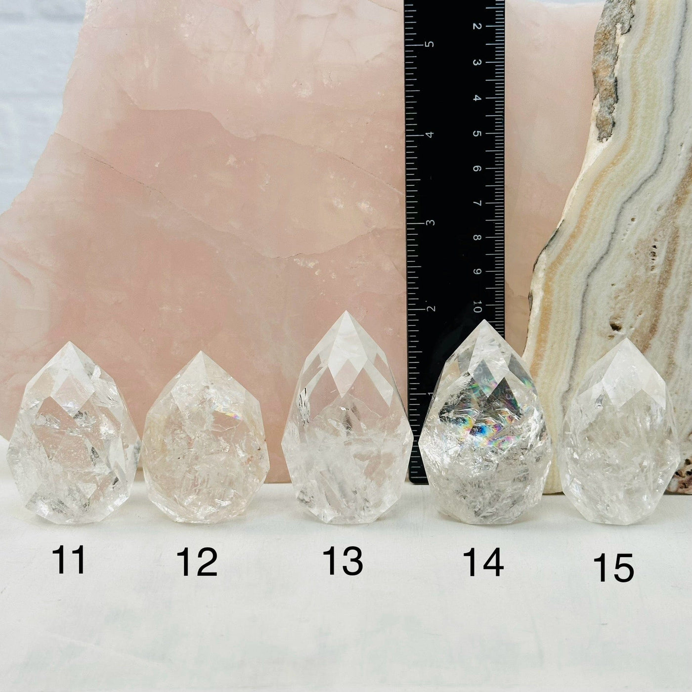 Faceted Clear Quartz Crystal Egg Point - You Choose - next to a ruler for size reference