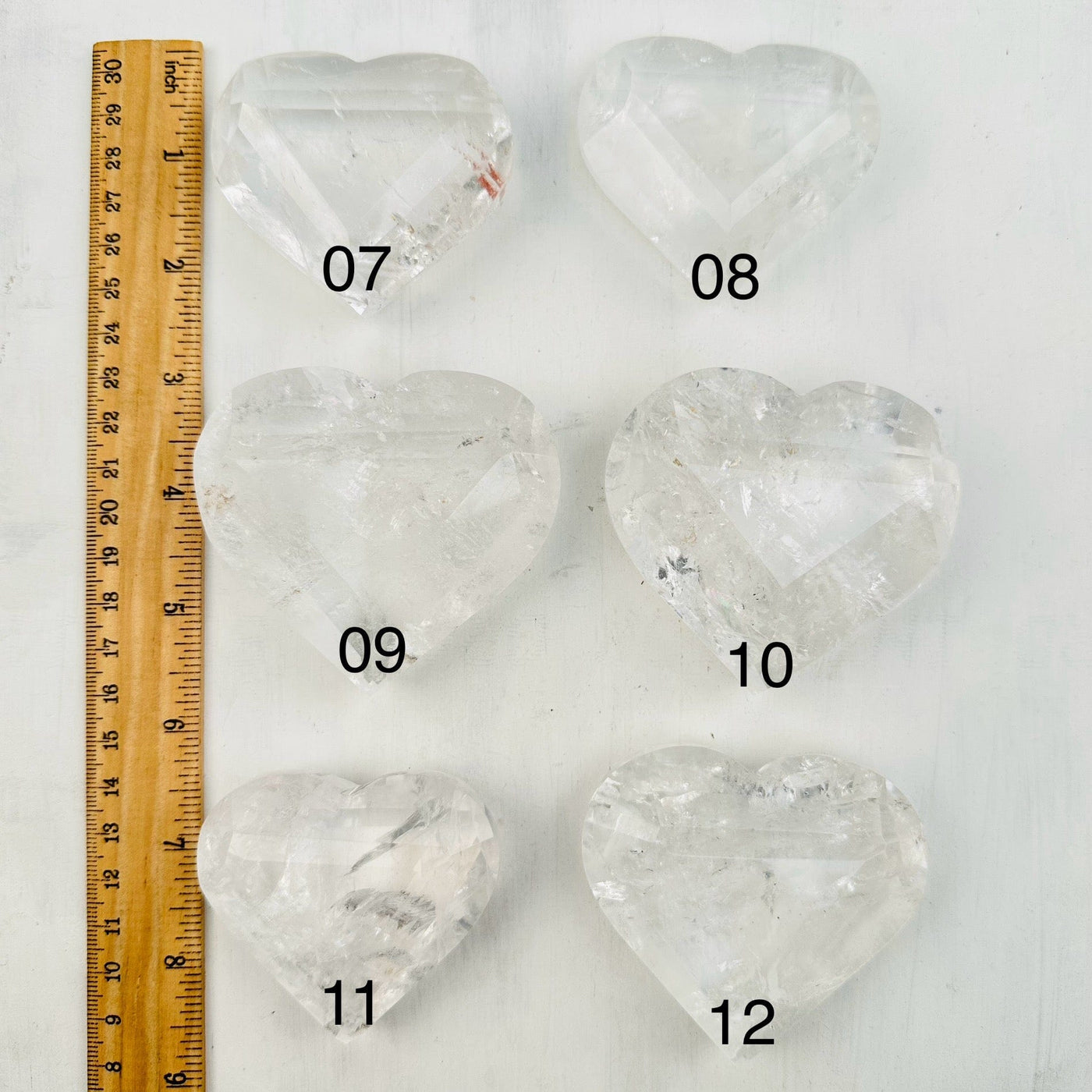 Faceted Crystal Quartz Heart - Crystal Heart - You Choose - next to a ruler for size reference