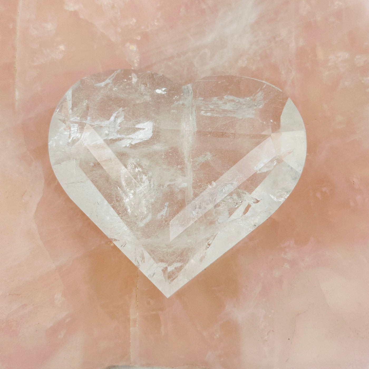 Faceted Crystal Quartz Heart displayed as home decor