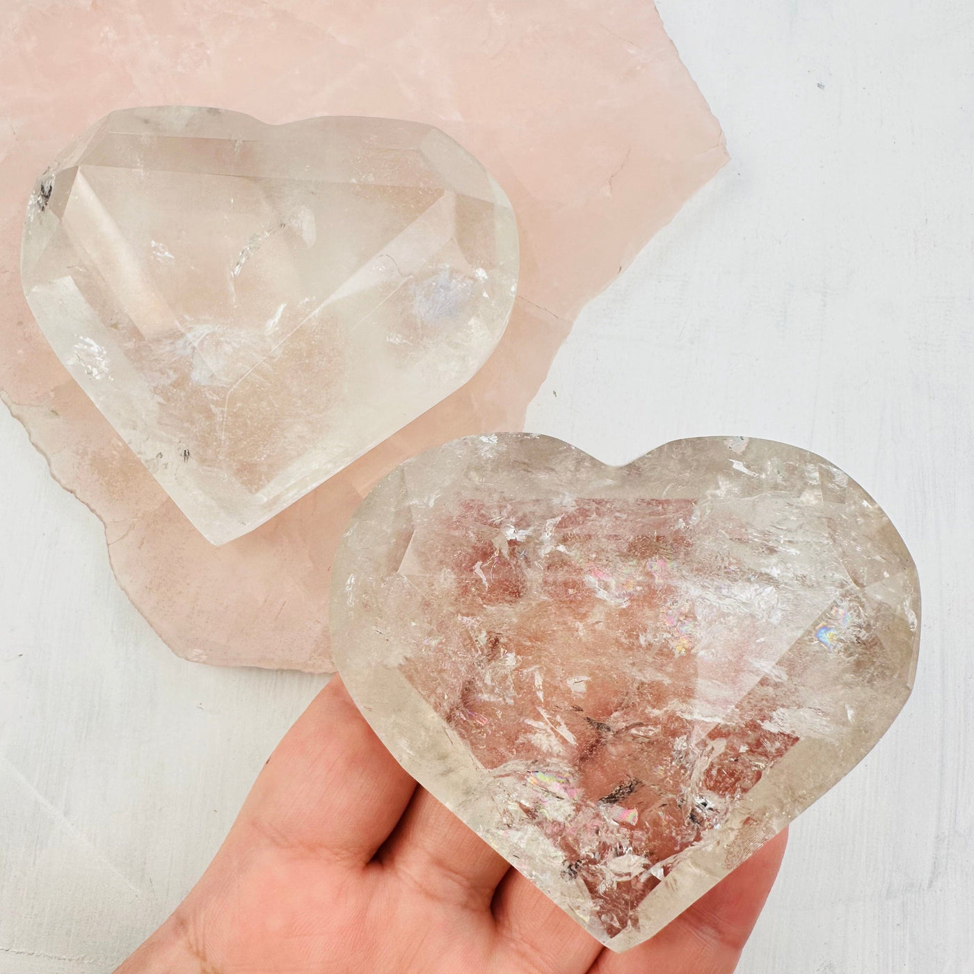Faceted Smoky Quartz Heart in hand for size reference 