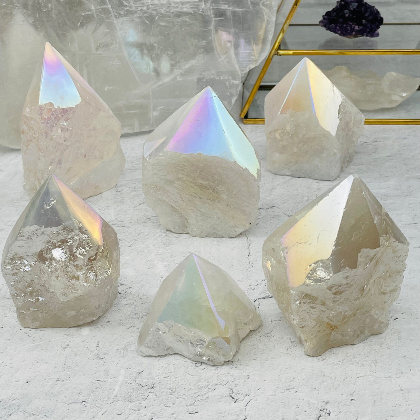 Crystal Quartz Semi Polished Point with Angel Aura Titanium Finish By Weight