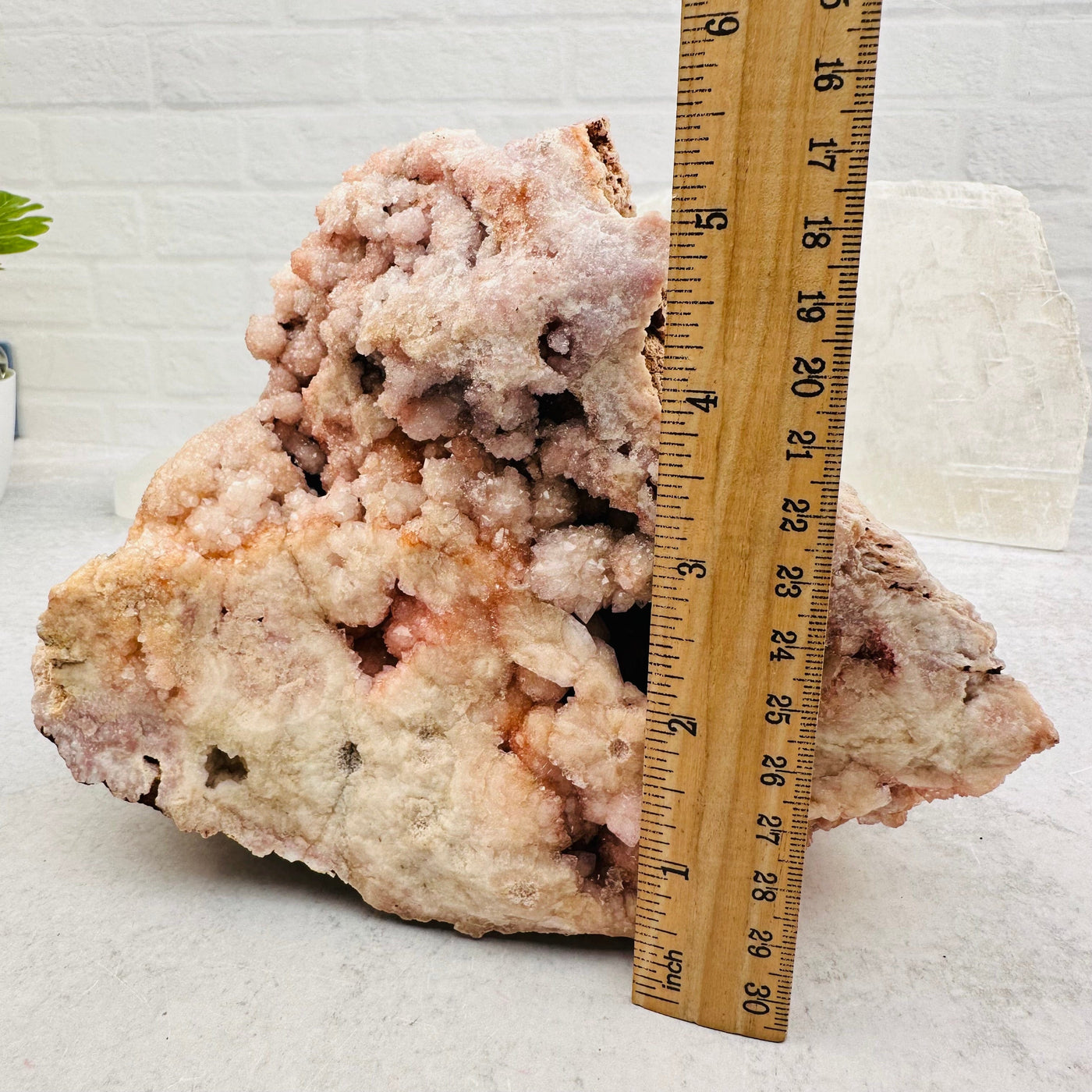 Pink Amethyst Freeform next to a ruler for size reference 