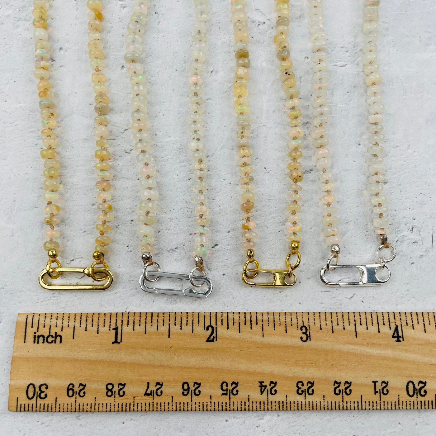 necklace bail next to a ruler for size reference 