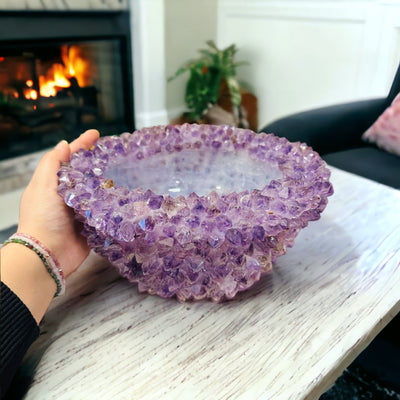 Amethyst Crystal Point Bowl next to hand for size reference 