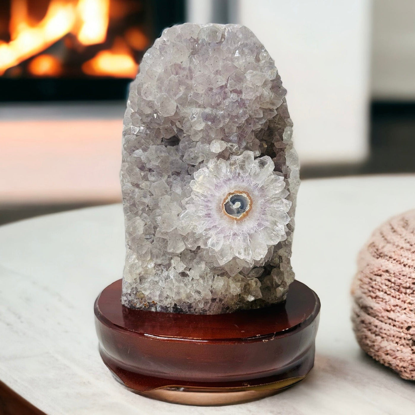 amethyst on wooden base displayed as home decor 