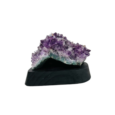 side view of the amethyst cluster to show the  natural rock formation on this cluster 