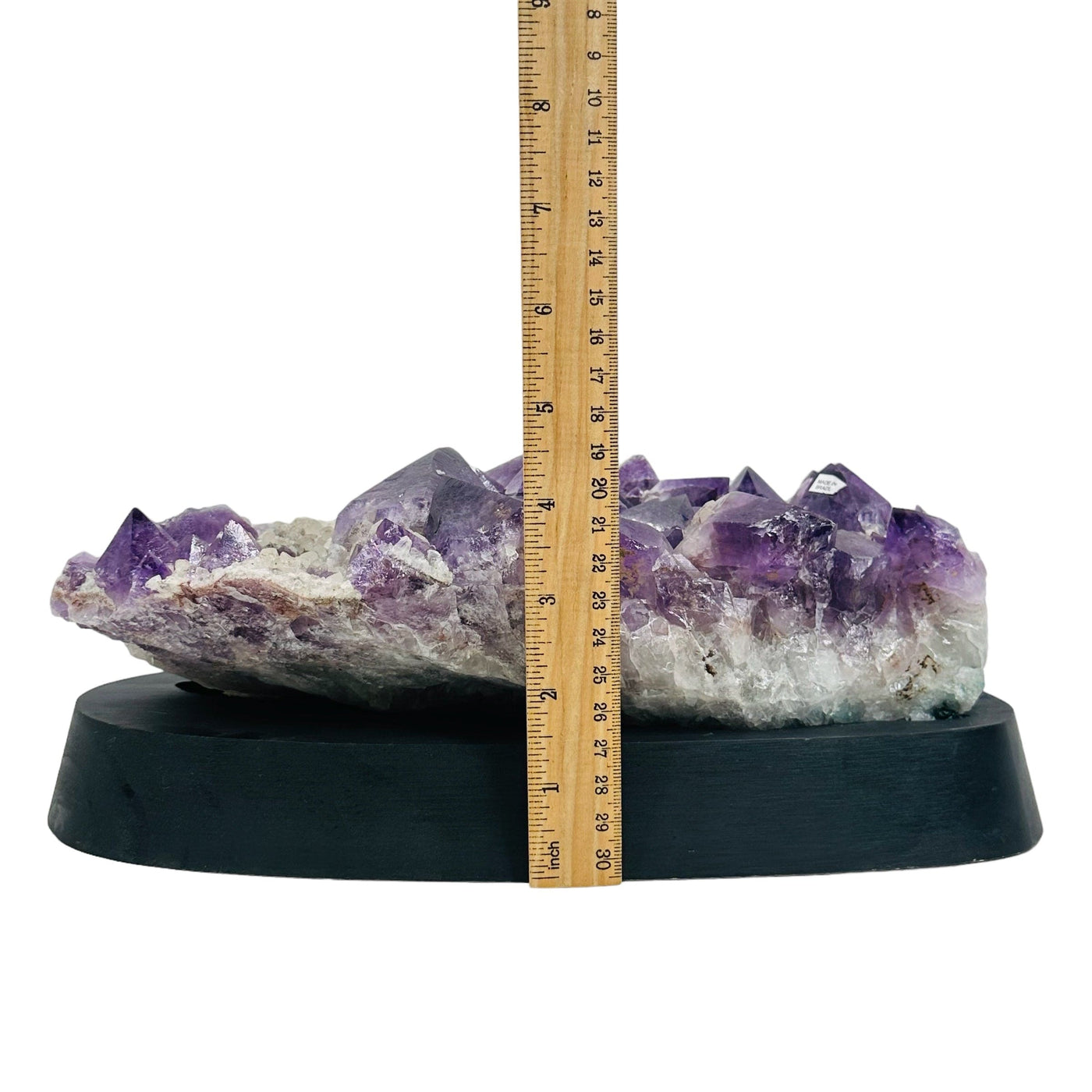 Amethyst Crystal Cluster on Wooden Base - Large Table Setting next to a ruler for size reference 
