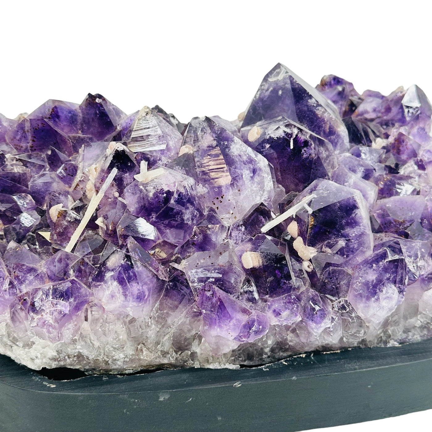 close up of the amethyst clusters with druzy formations on the top 