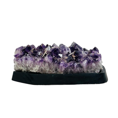 amethyst cluster has small sugar druzy formations on the top 