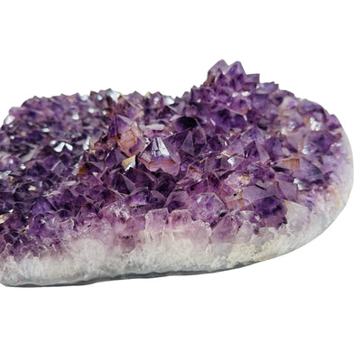 side view to show the amethyst clusters that stick out of the heart 