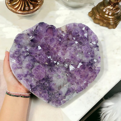 Large Amethyst Cluster Heart - Natural Amethyst next to hand for size reference 
