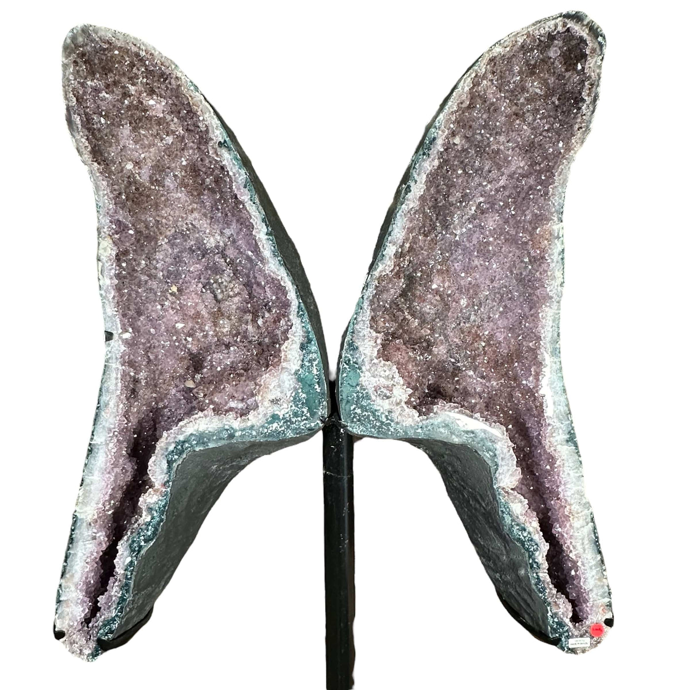 close up of the amethyst druzy wings to show the different color shades 