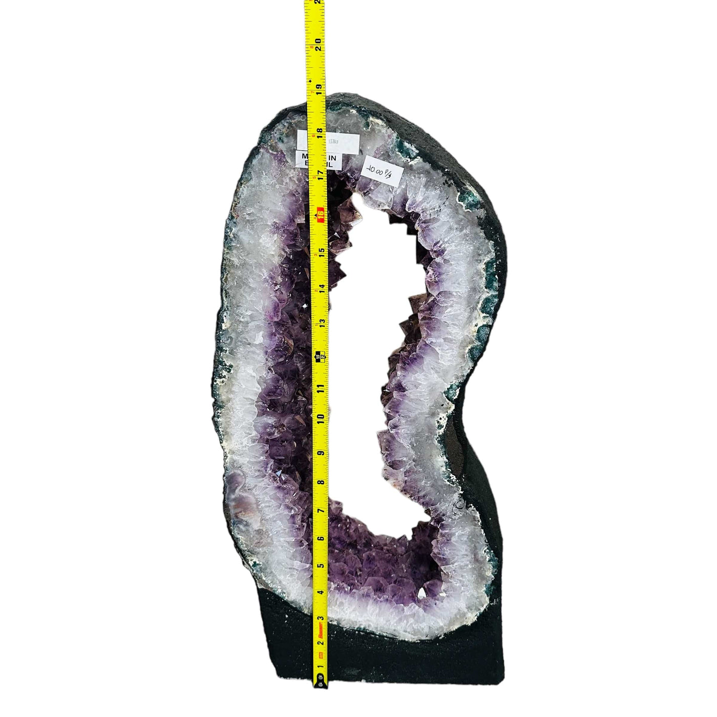 Amethyst Crystal Portal next to a ruler for size reference 