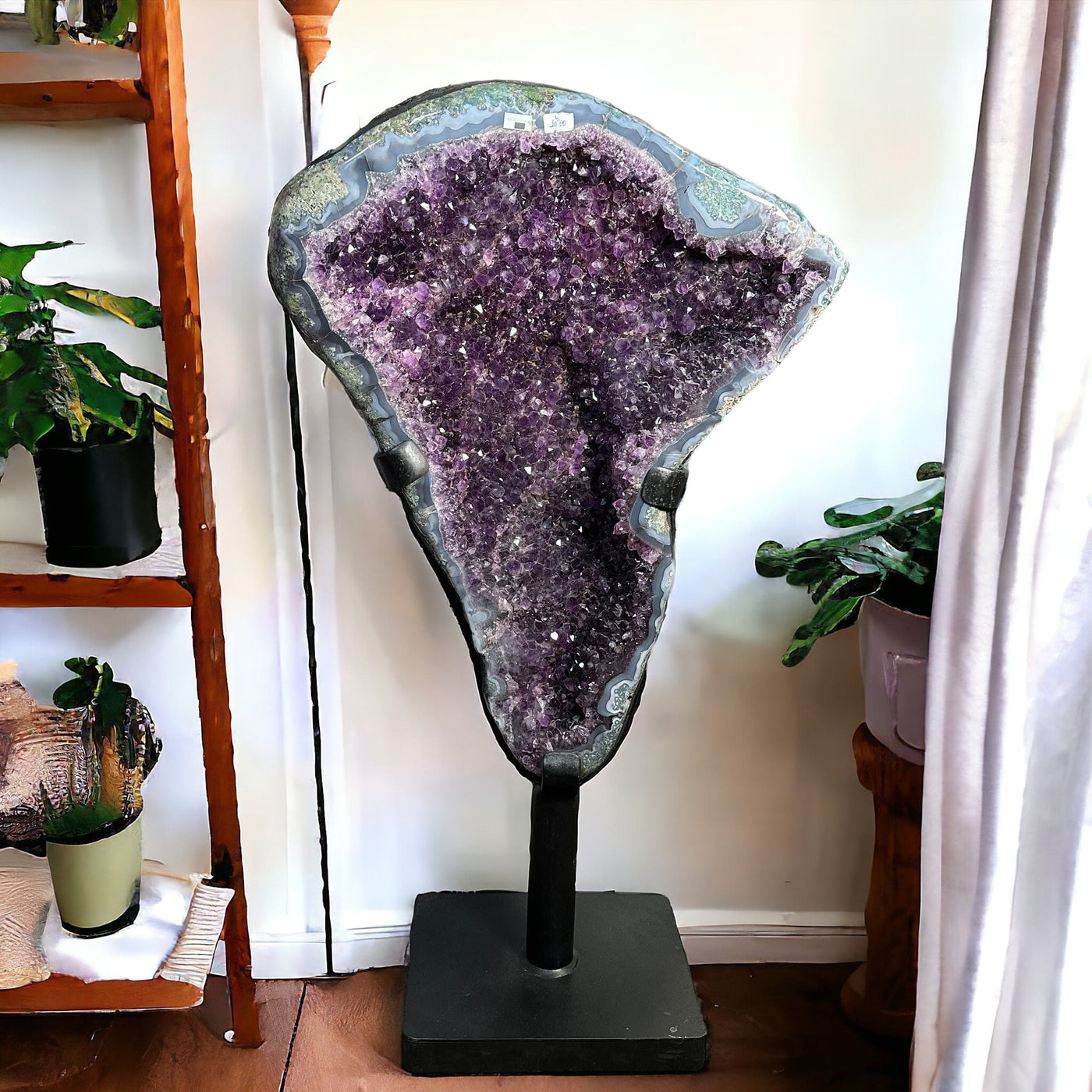 Amethyst Cluster on a custom Black Metal Stand displayed as home decor 