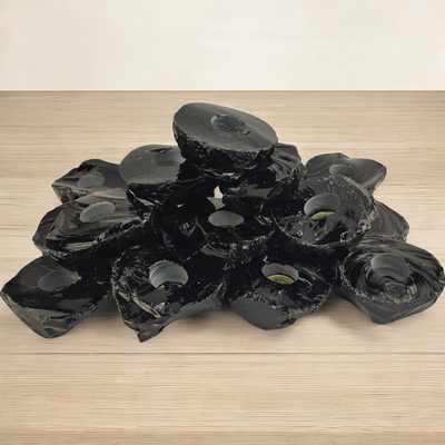 Black Obsidian Candle Holder - Pack of 20 Crystal Candle Holders - Wholesale Bulk Deal side view stacked on wooden surface