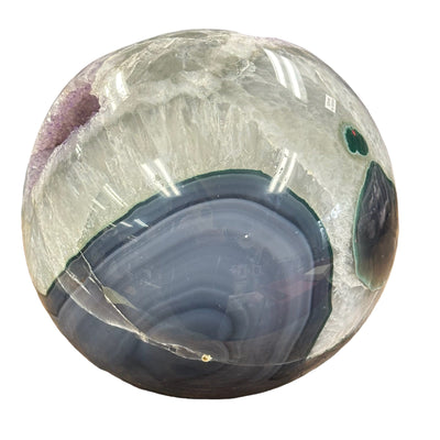 close up of the bottom of the sphere showing nice green agate banding 