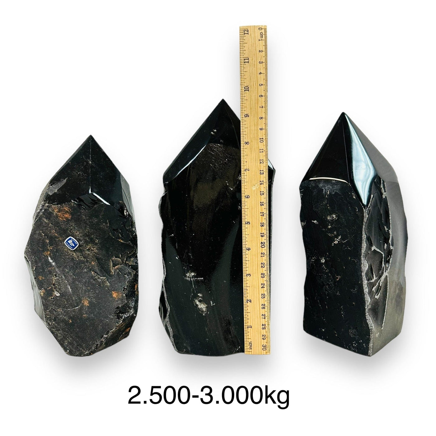 Black Obsidian Crystal Semi Polished Points - By Weight - next to a ruler for size reference