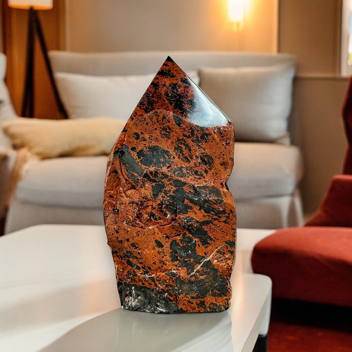 Mahogany Obsidian Crystal Semi Polished Cut Base displayed as home decor 