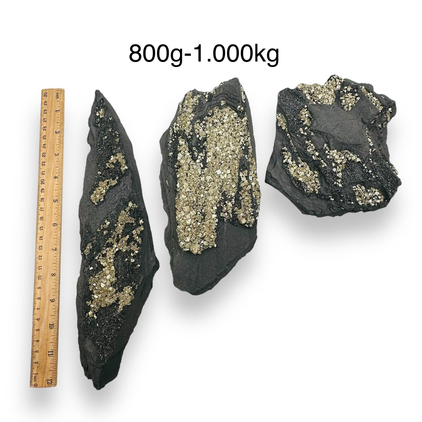 Pyrite on Basalt Matrix sold by weight next to a ruler for size reference