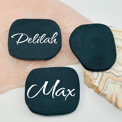 obsidian place cards displayed on wedding setting