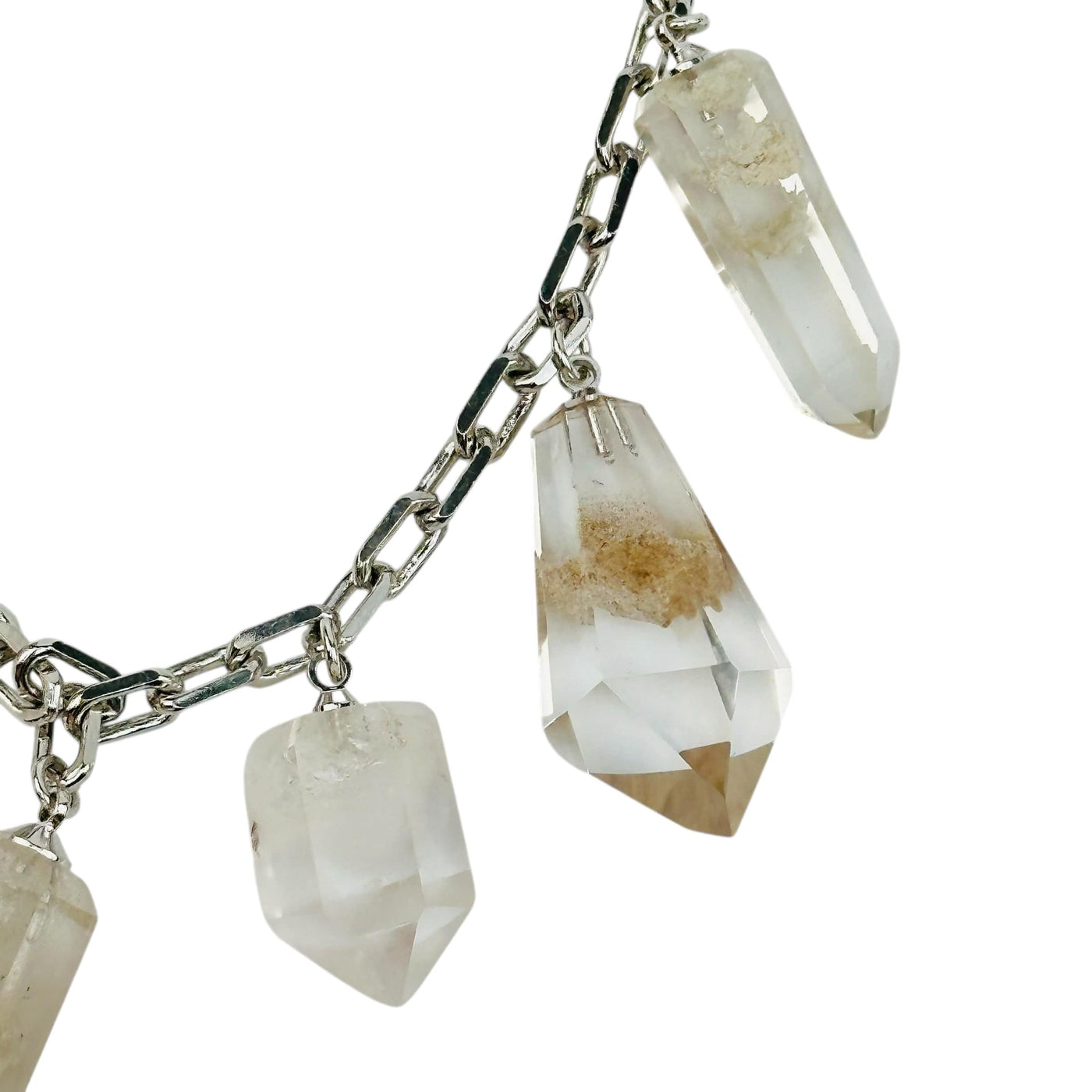 close up of the details on these lodolite charms 