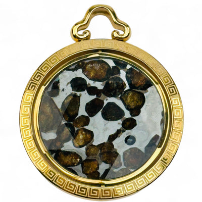 close up of the details on this meteorite pendant 