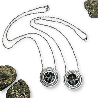 Sericho Pallasaite Meteorite Necklaces come on a 24" silver chain 