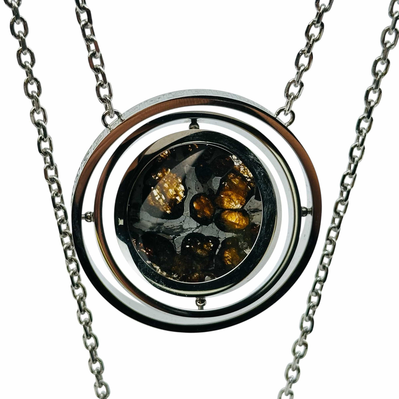 close up of the details on this meteorite pendant 