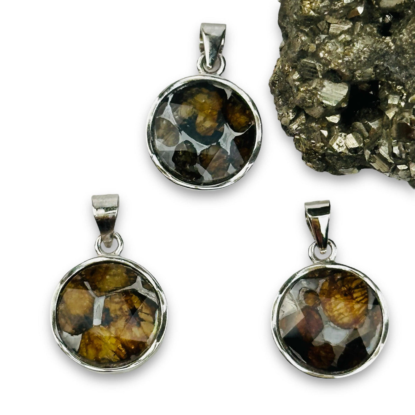 multiple pendants displayed to show the differences in the sizes and patterns 