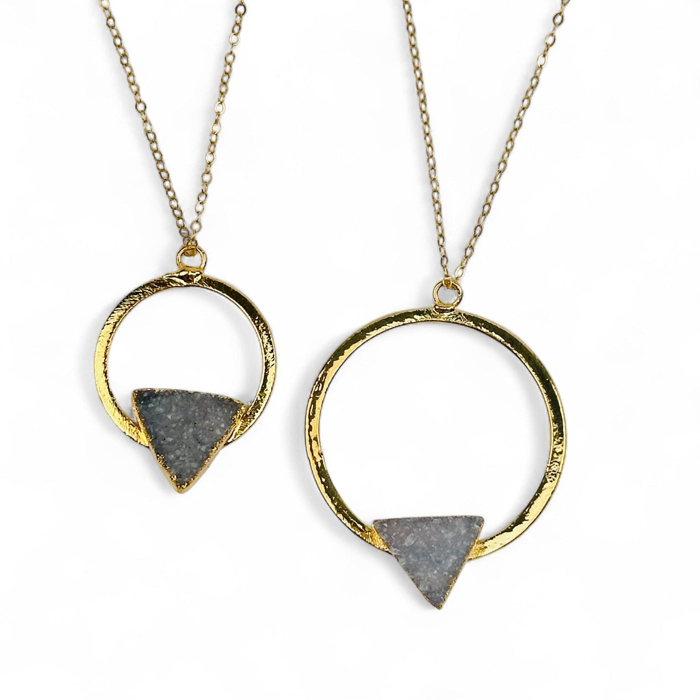 close up of the pendants on a necklace