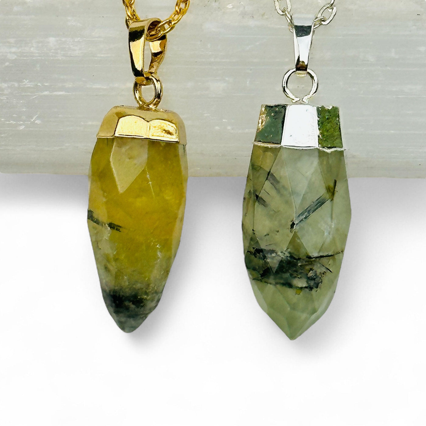 close up of the details on these prehnite spike pendants 