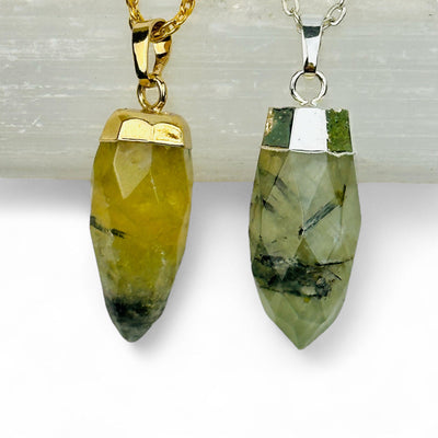 close up of the details on these prehnite spike pendants 