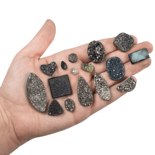 Black Titanium shimmer Colored Cabs in hand for size reference 