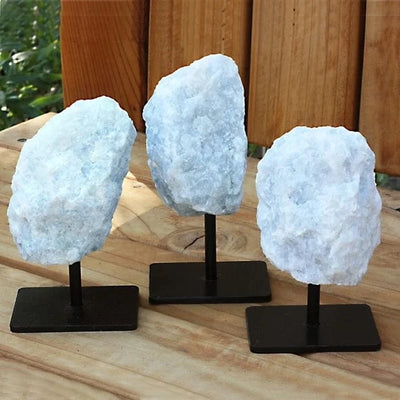 3 Blue Calcite on Metal Stand on display