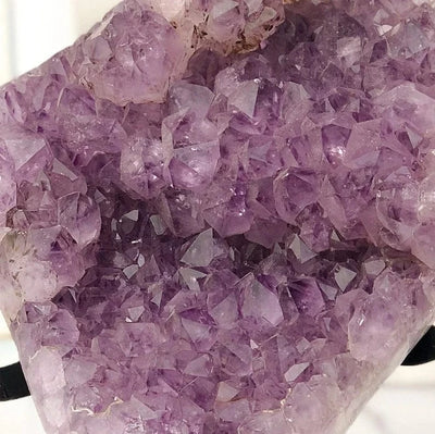 Amethyst Crystal Cluster on Metal Stand  up close of crystals