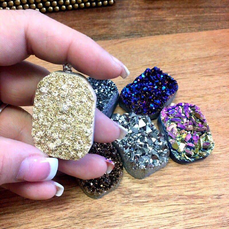  Mystic Druzy  Freeform Crystal Pendants shown with 1 in a hand for size reference
