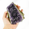 Amethyst Crystal Cluster on hand for size reference.