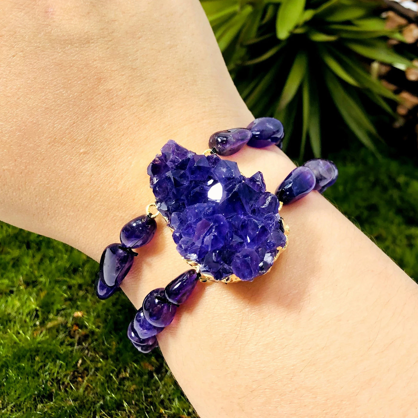 amethyst bracelet with decorations in the background