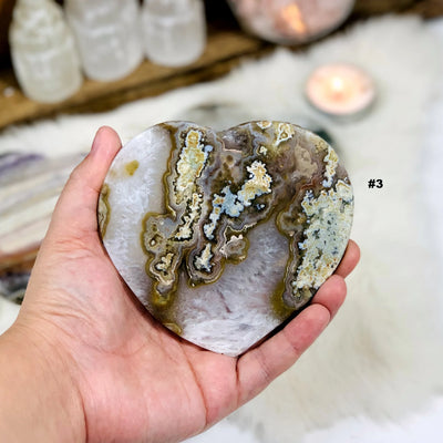 agate heart with decorations in the background