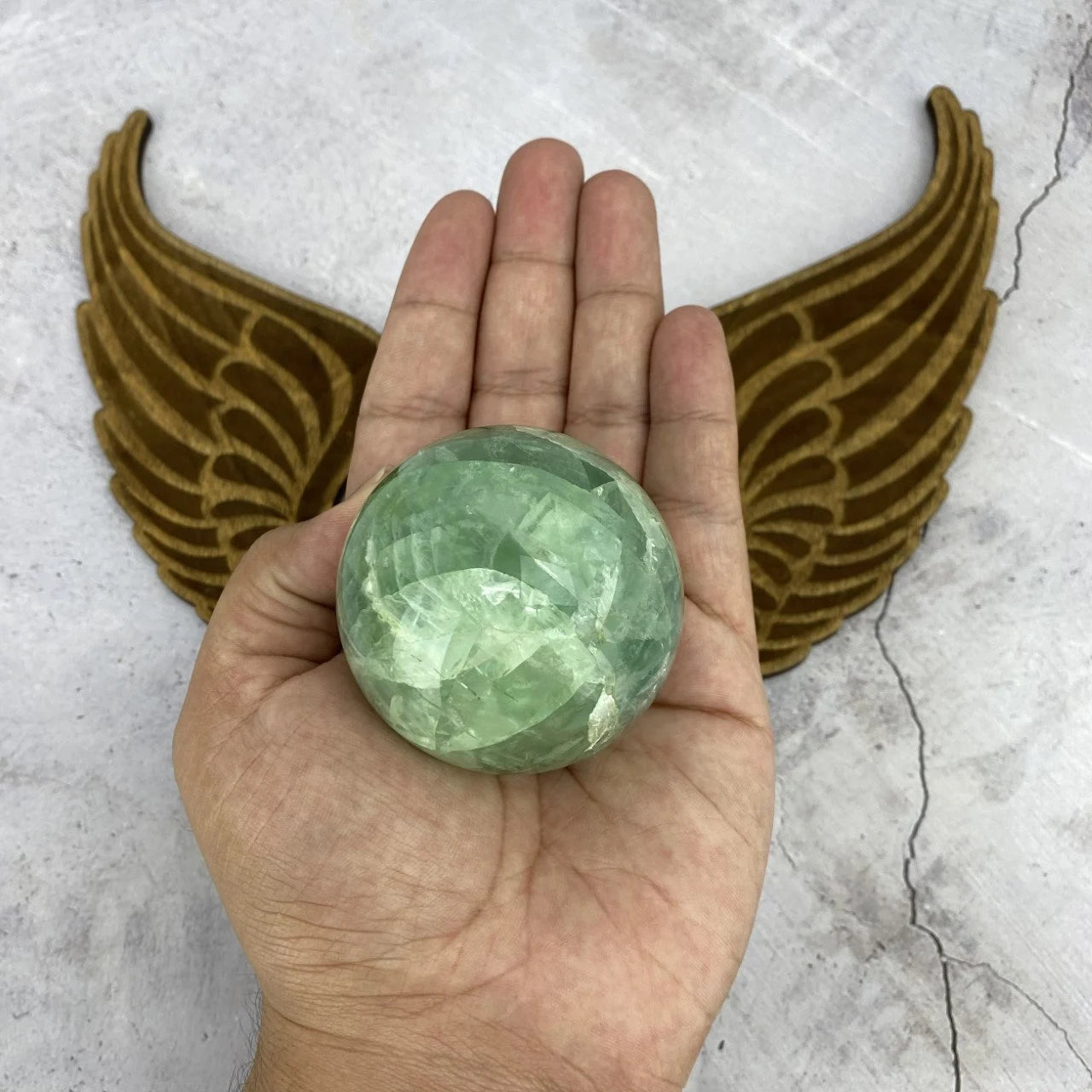 fluorite with decorations in the background