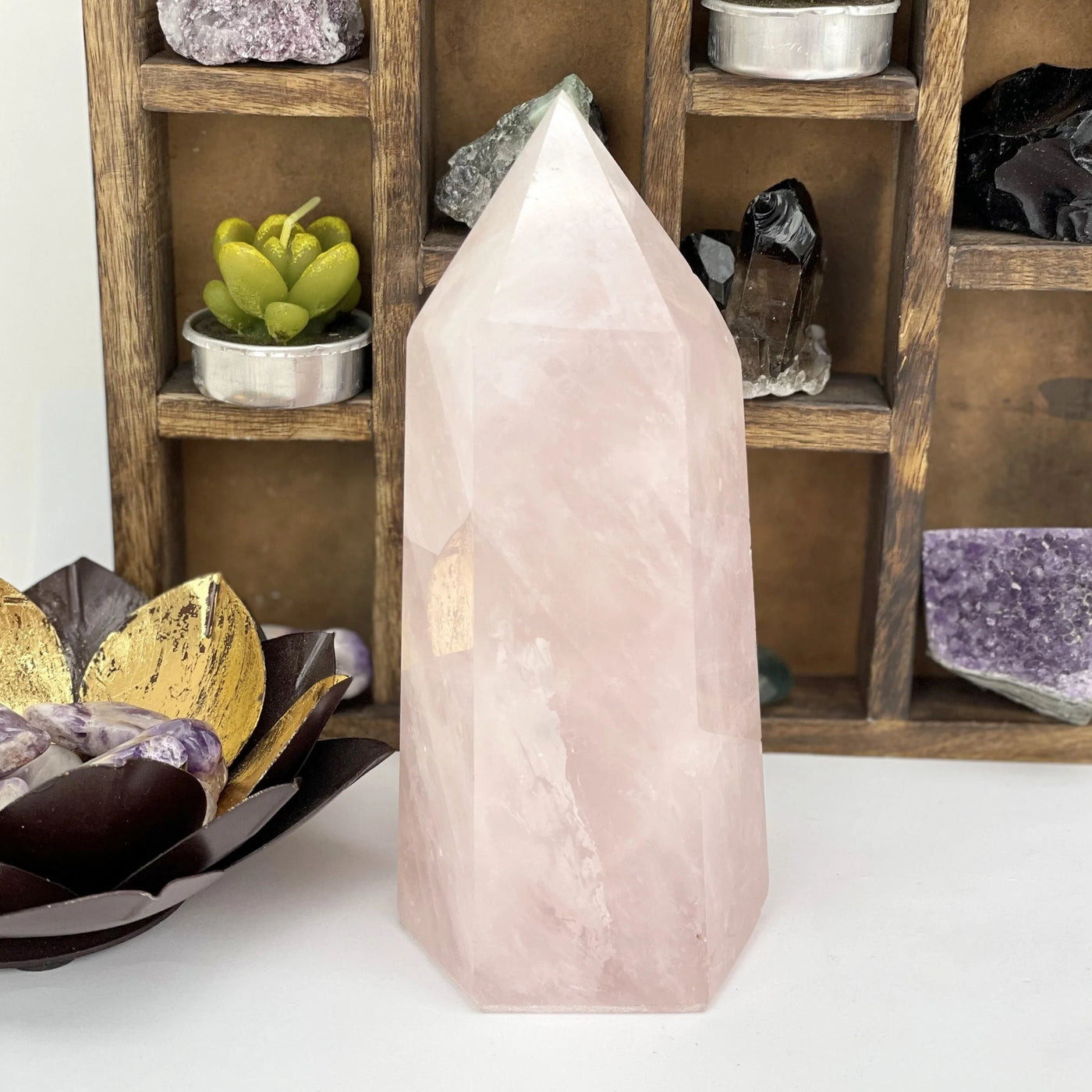 rose quartz with decorations in the background