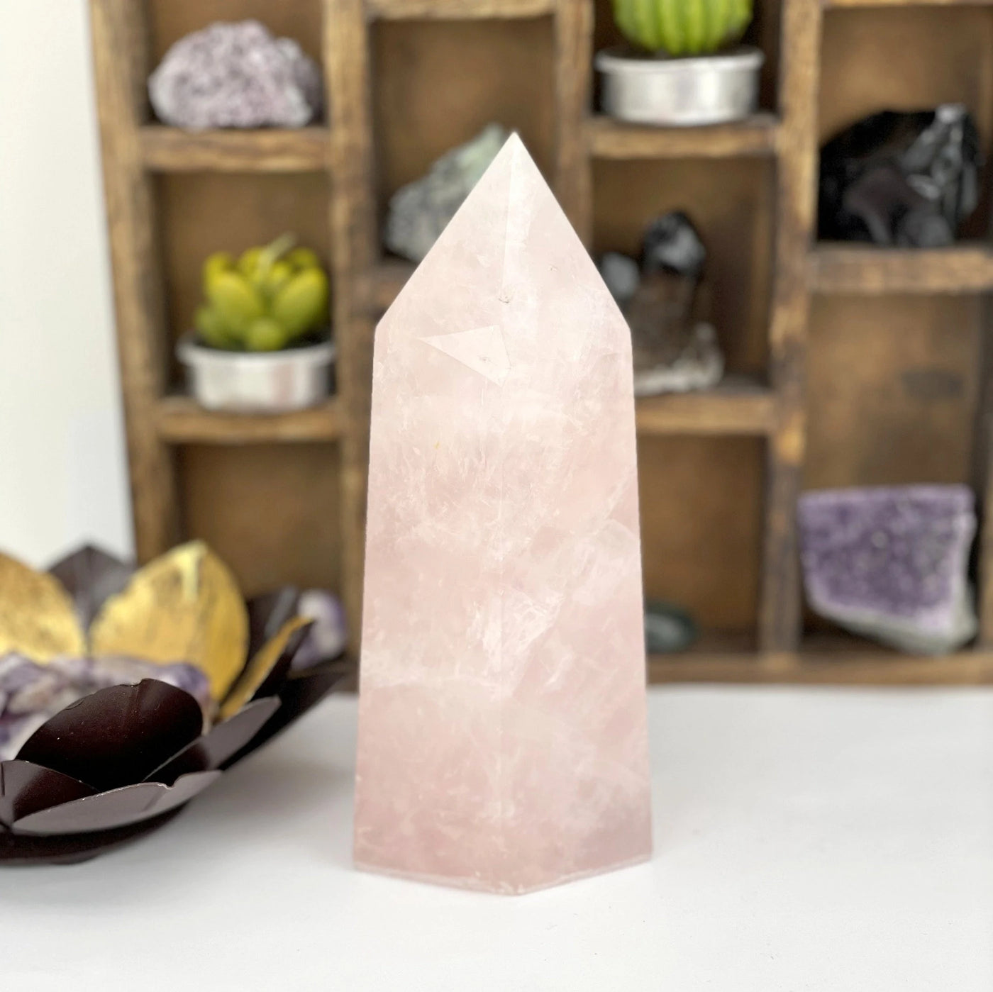 rose quartz with decorations in the background