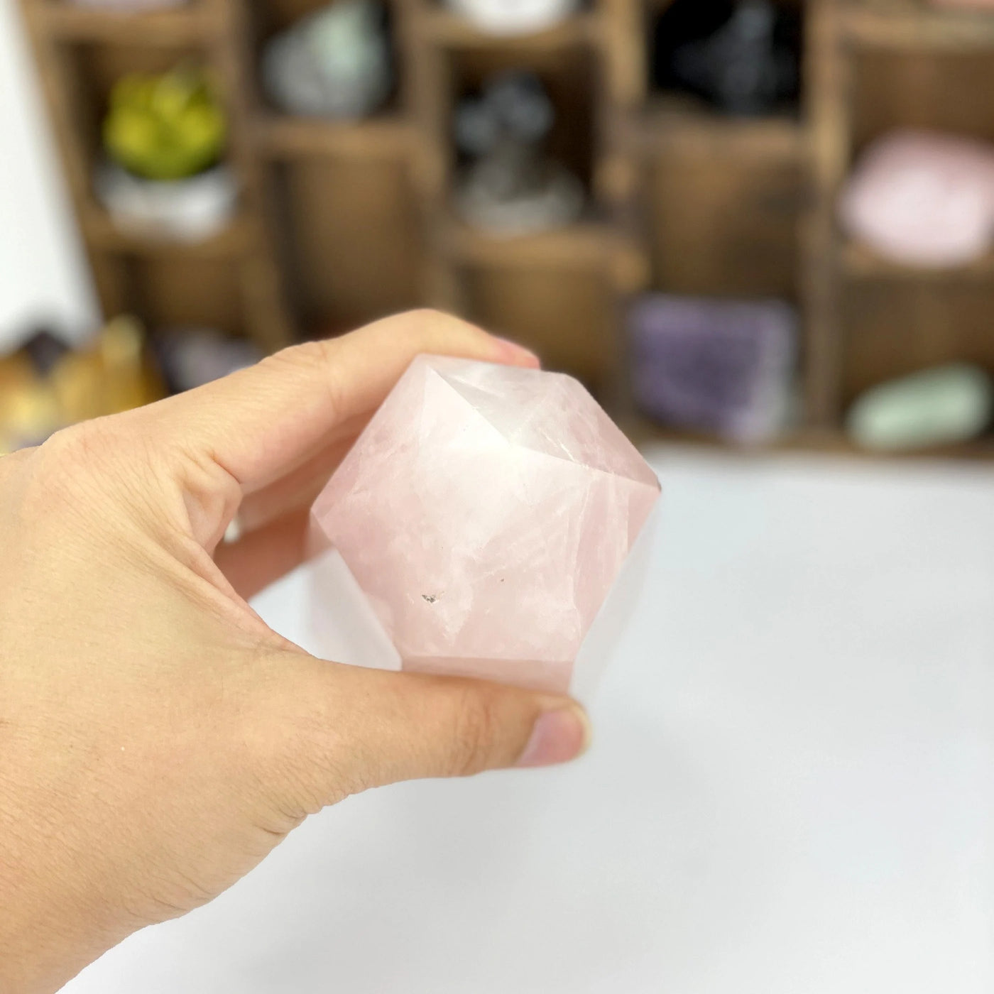 rose quartz with decorations in the background