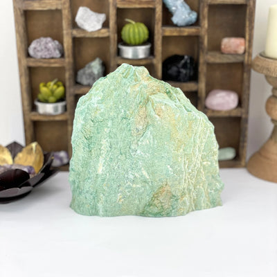 fuchsite with decorations in the background