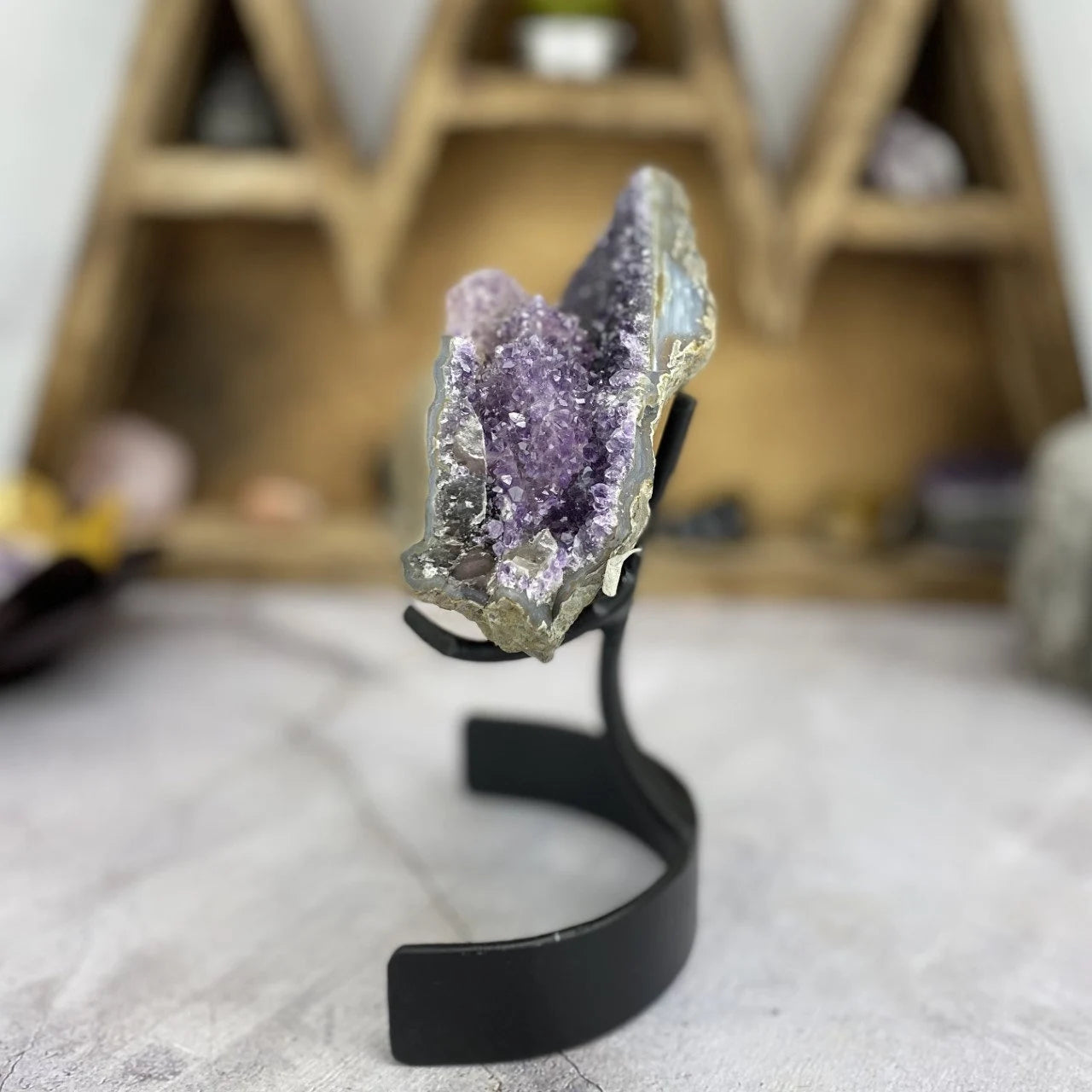 amethyst with decorations in the background