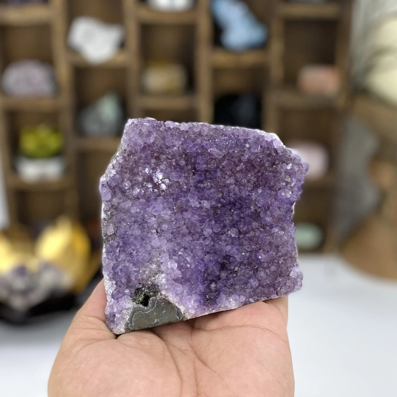 amethyst with decorations in the background