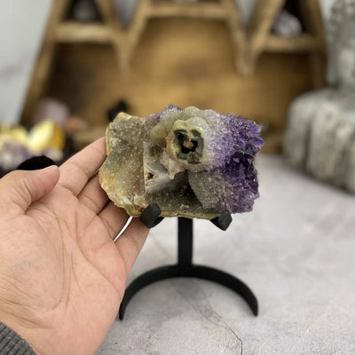 amethyst with decorations in the background